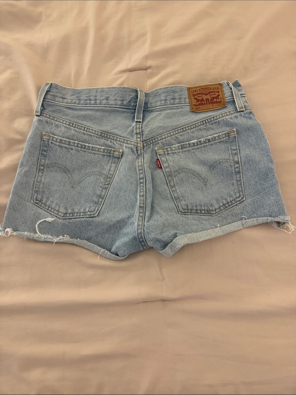 Classic Light Blue Distressed Levi’s Denim Shorts - Women - Picture 2 of 4